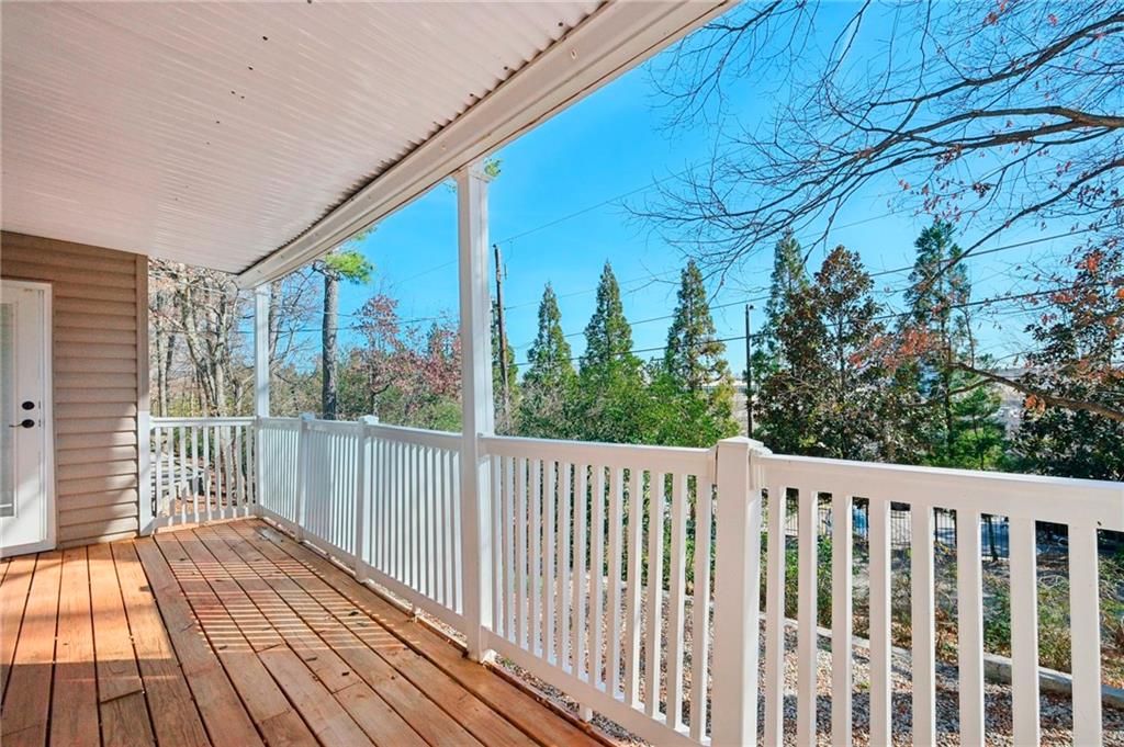 1750 Clairmont Road, Unit 21 Decatur, GA 30033 - Photo 18 of 23 a view of a wooden balcony