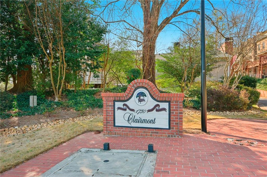 1750 Clairmont Road, Unit 21 Decatur, GA 30033 - Photo 21 of 23 a sign broad on the side of the road