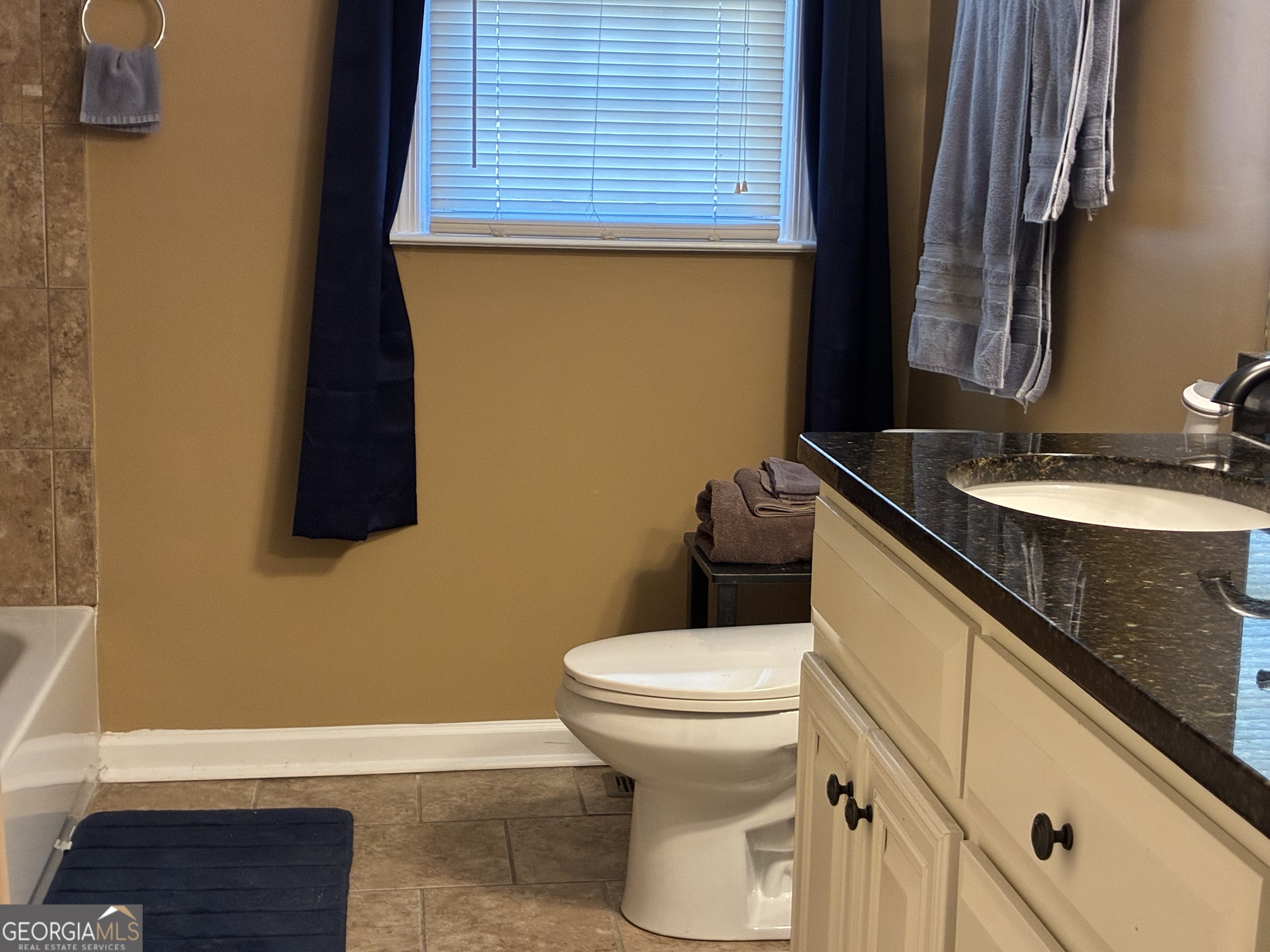 3491 Sandy Circle Macon, GA 31216 - Photo 32 of 49 a bathroom with a sink and a toilet