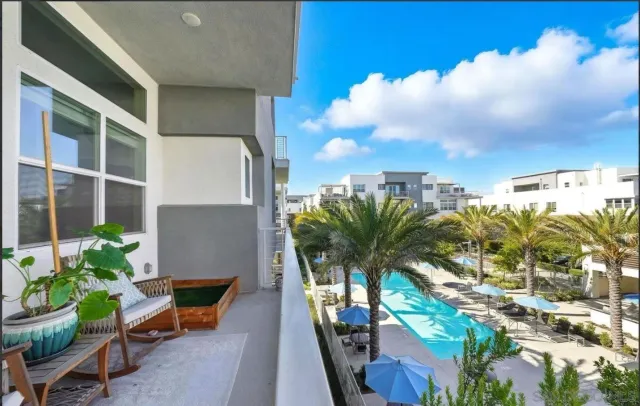 a view of a terrace with sitting area