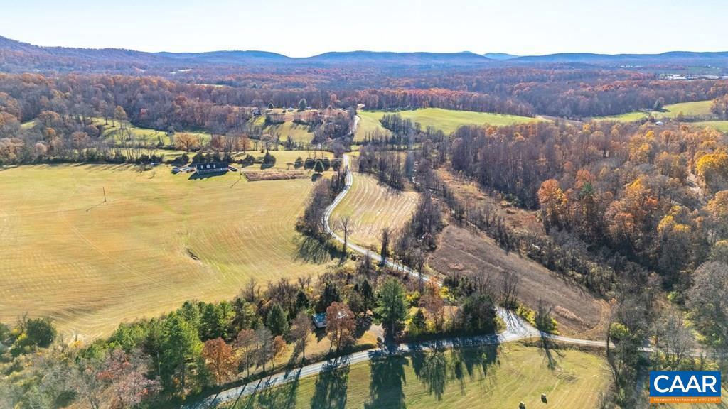 1066 Stevens Cove Road Lovingston, VA 22949 - Photo 31 of 34 a view of a city with mountains in the background