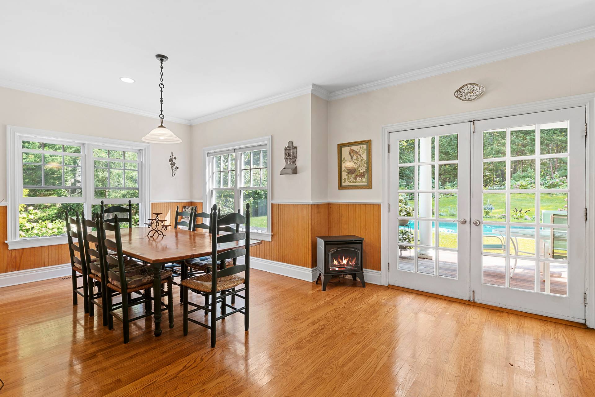 22 Deerwood Path Sag Harbor, NY 11963 - Photo 8 of 18 a view of a dining room with furniture window and wooden floor