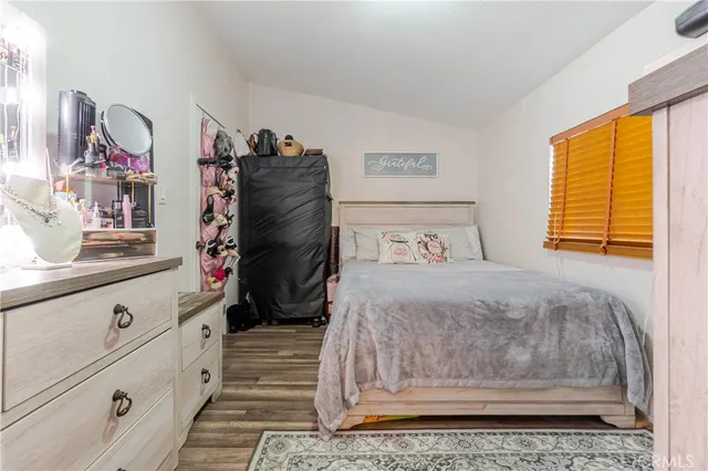 a white toilet sitting next to a shower curtain