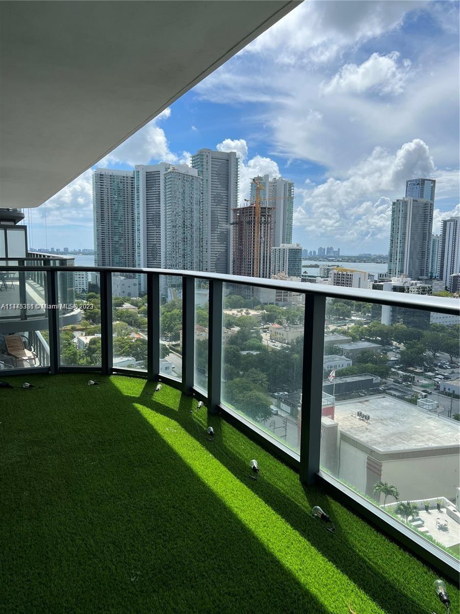 a view of a city from a balcony