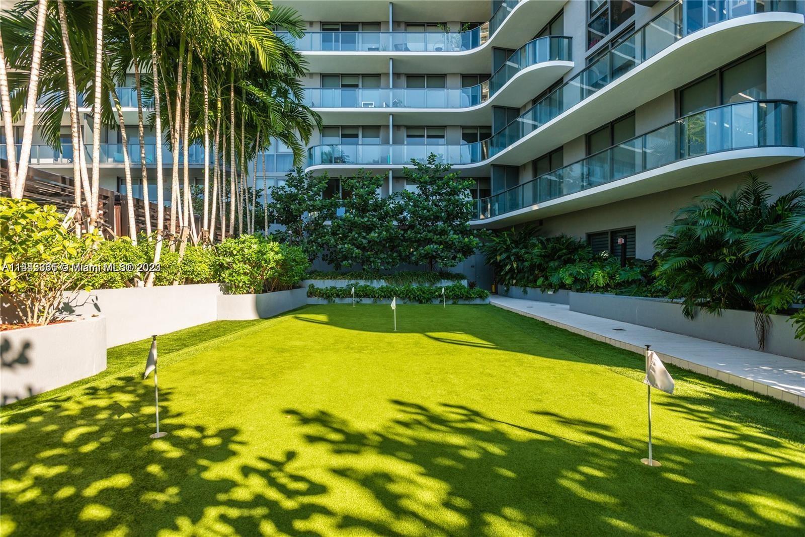 Midtown Miami Miami, FL 33137 - Photo 7 of 14 a view of an swimming pool with an outdoor seating