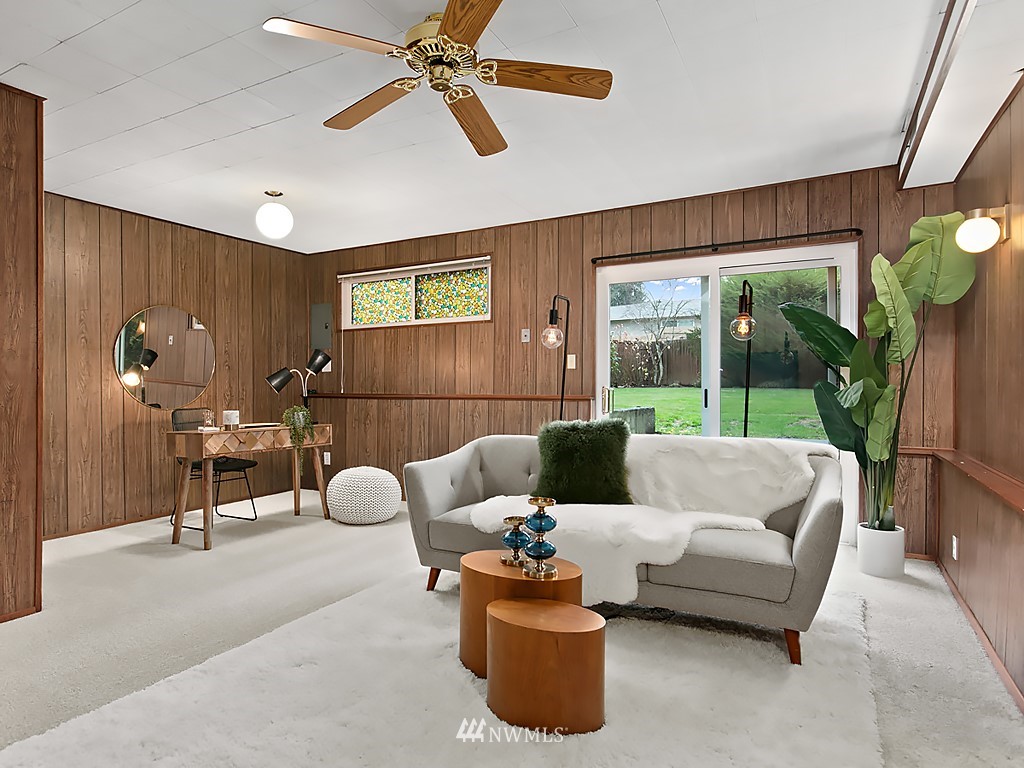 1803 Whitman Avenue Northeast Renton, WA 98059 - Photo 14 of 19 a living room with furniture and a large window