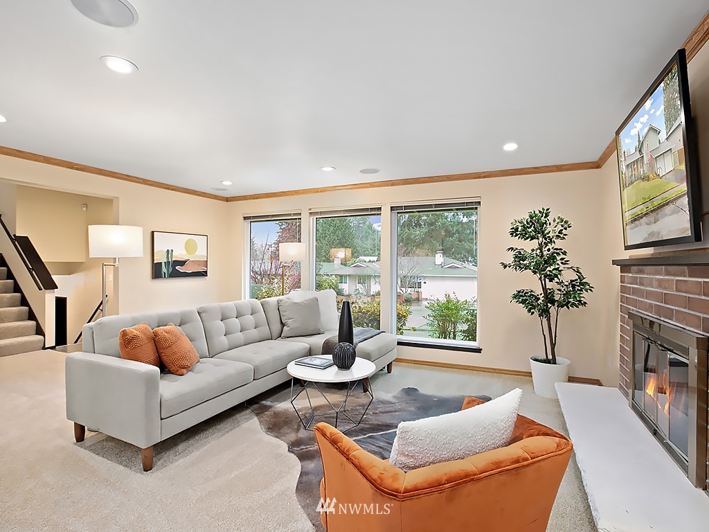 1803 Whitman Avenue Northeast Renton, WA 98059 - Photo 3 of 19 a living room with furniture and a large window