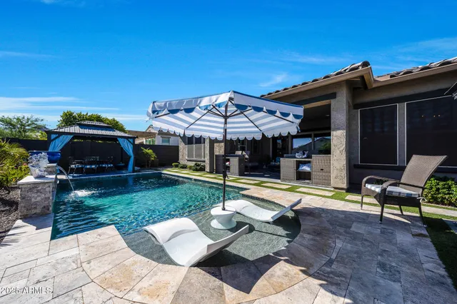 a view of a back yard of the house