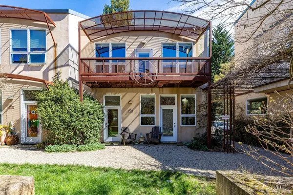 front view of a house with a small yard