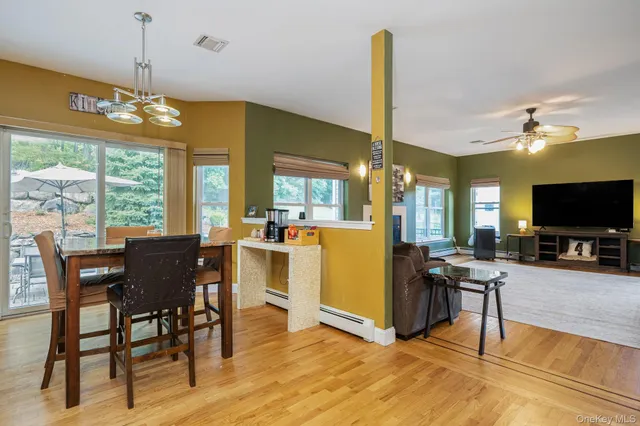 a view of a dining room with furniture window and outside view