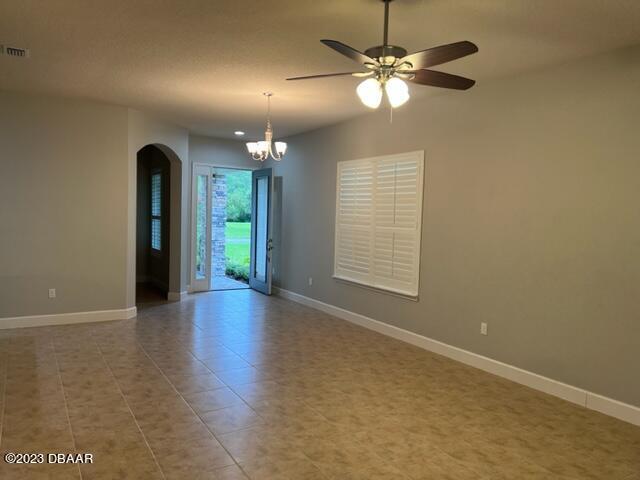 742 Aldenham Lane Ormond Beach, FL 32174 - Photo 15 of 25 wooden floor in an empty room with a window