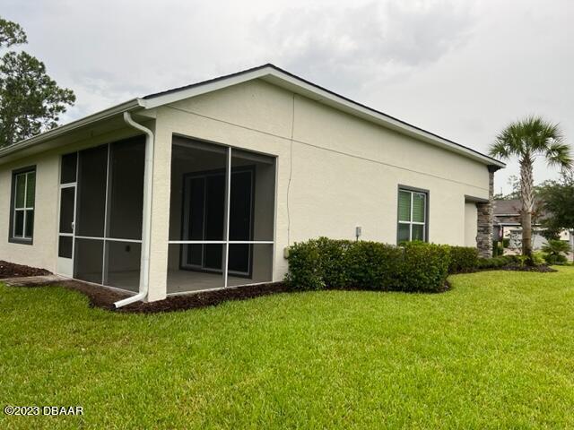 742 Aldenham Lane Ormond Beach, FL 32174 - Photo 25 of 25 a front view of a house with a yard