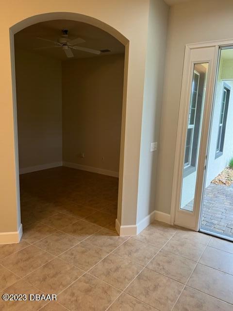 742 Aldenham Lane Ormond Beach, FL 32174 - Photo 3 of 25 an empty room with wooden door