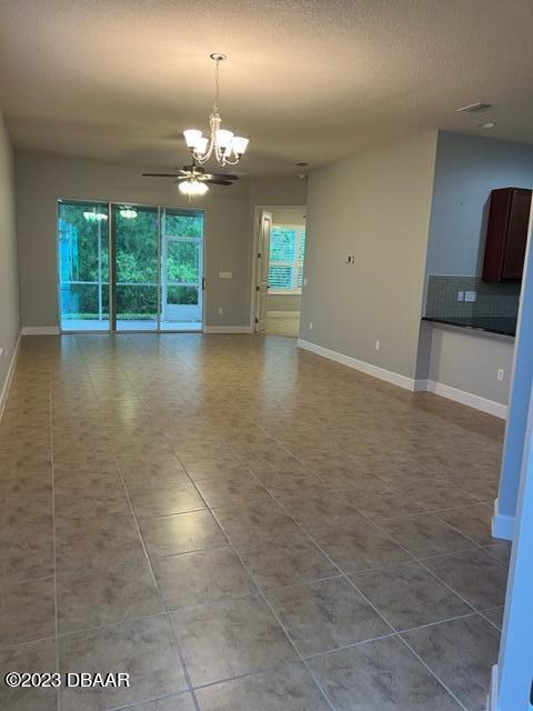 742 Aldenham Lane Ormond Beach, FL 32174 - Photo 4 of 25 a view of a livingroom with a chandelier