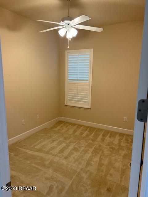 742 Aldenham Lane Ormond Beach, FL 32174 - Photo 9 of 25 a view of an empty room with a window
