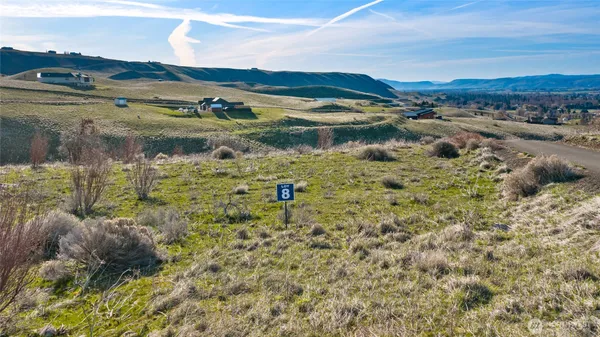 a view of a lake with mountains in the background