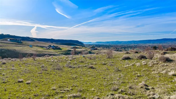a view of ocean and mountain