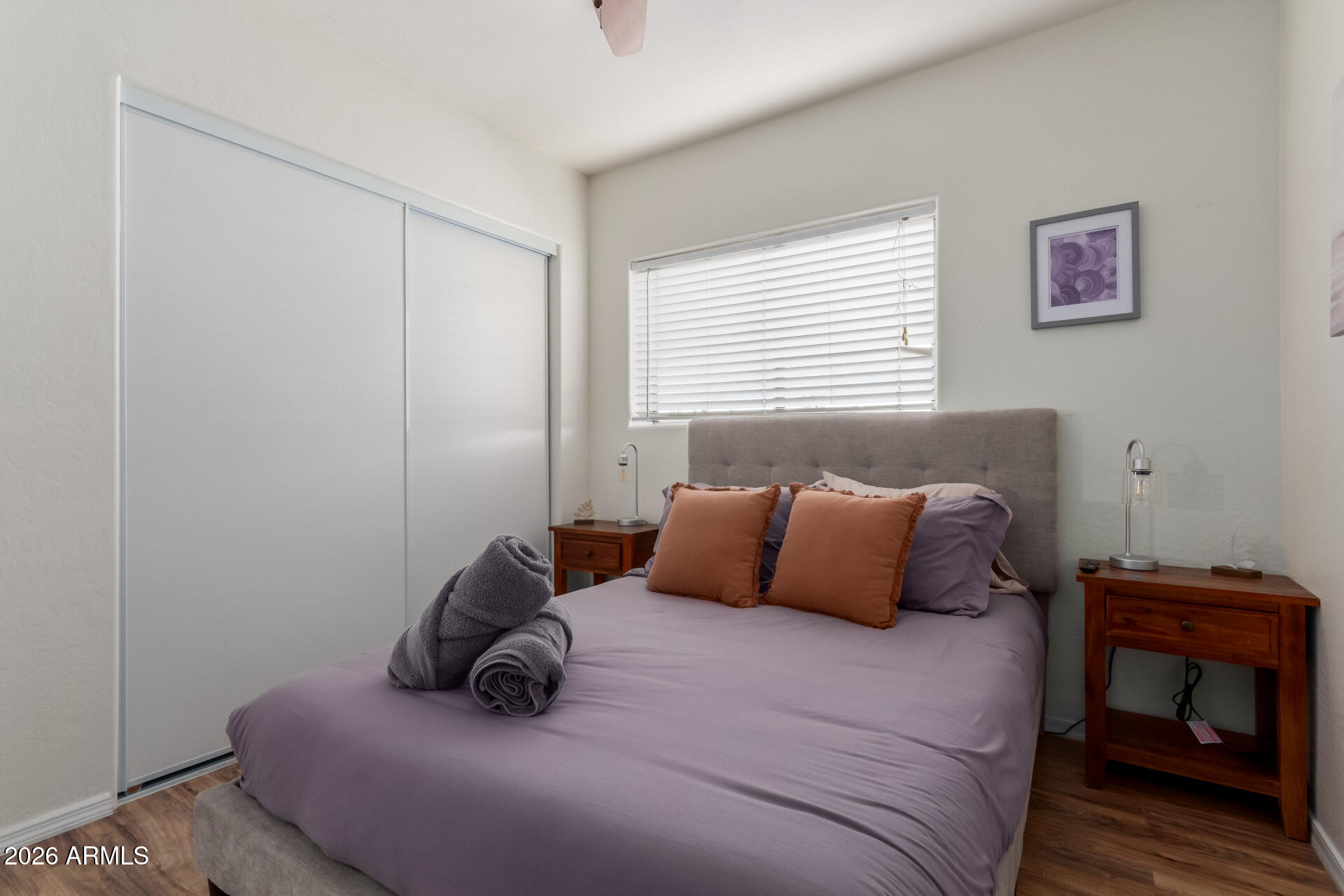2715 West Royal Palm Road Phoenix, AZ 85051 - Photo 22 of 32 a bedroom with a bed and a window