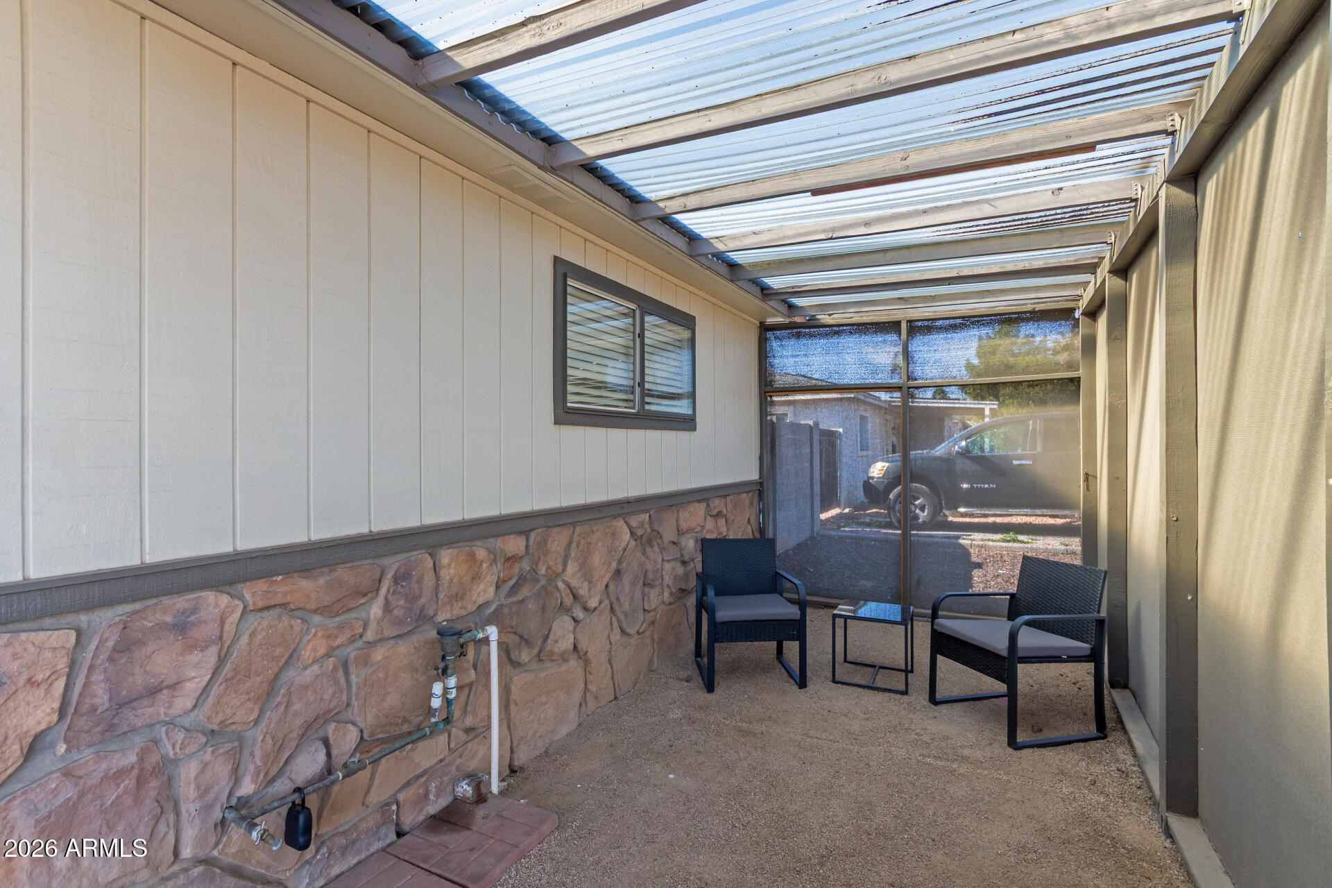 2715 West Royal Palm Road Phoenix, AZ 85051 - Photo 6 of 32 a dining room with furniture and window
