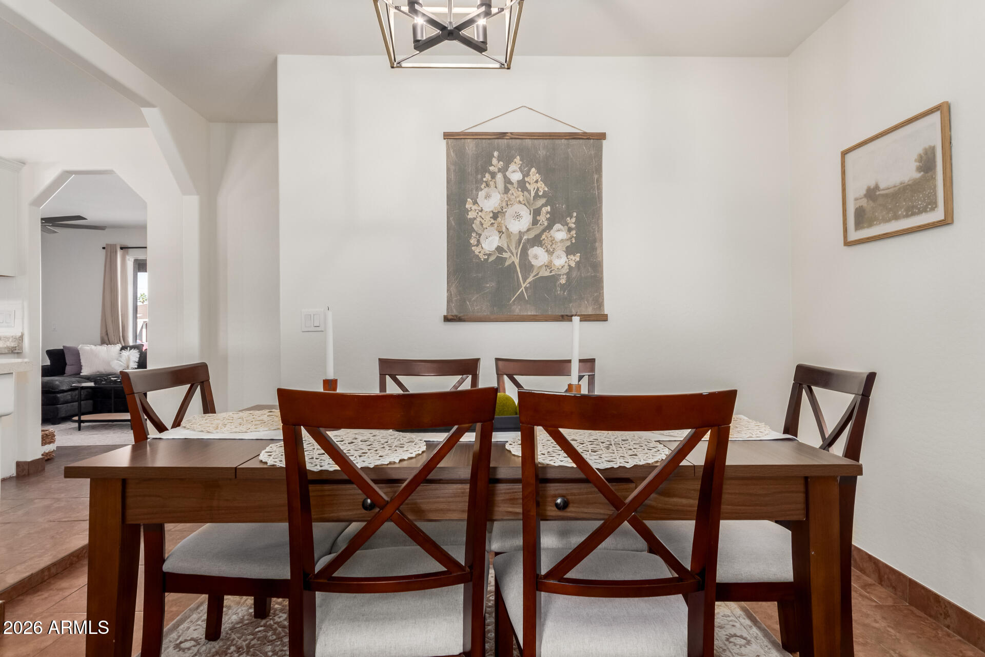 2715 West Royal Palm Road Phoenix, AZ 85051 - Photo 10 of 32 a view of a dining room with furniture and a table