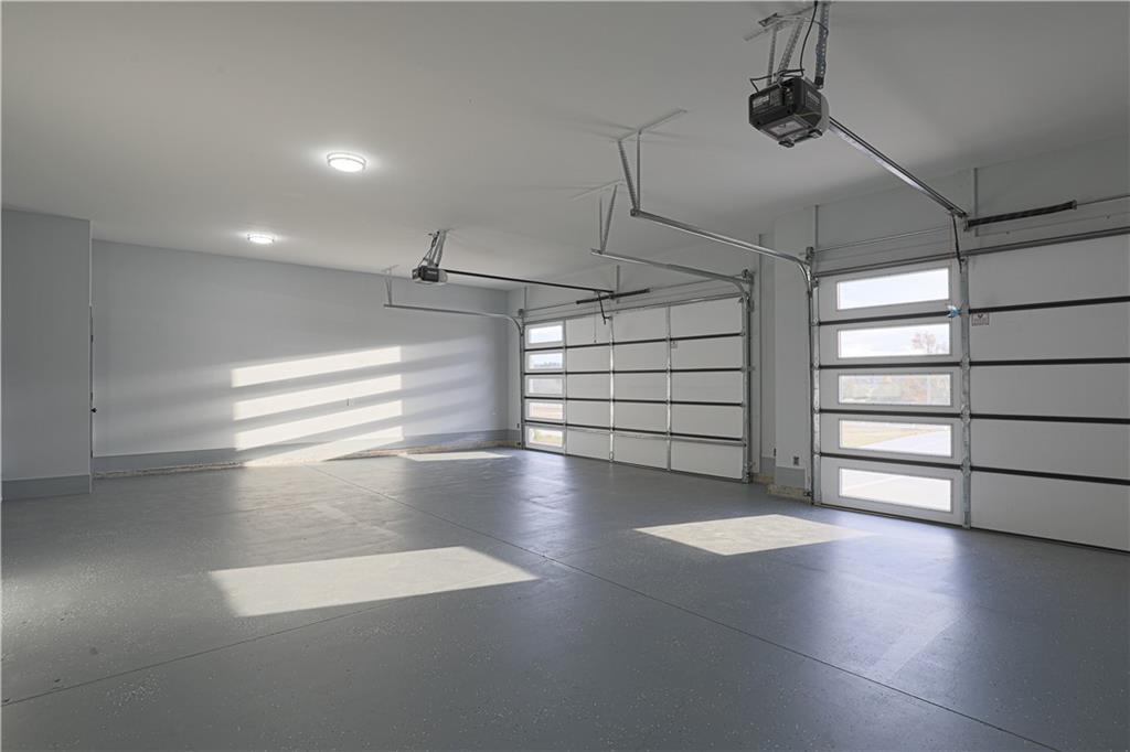 1341 Wheeler Creek Road Maysville, GA 30558 - Photo 22 of 51 a view of a room with racks on the wall