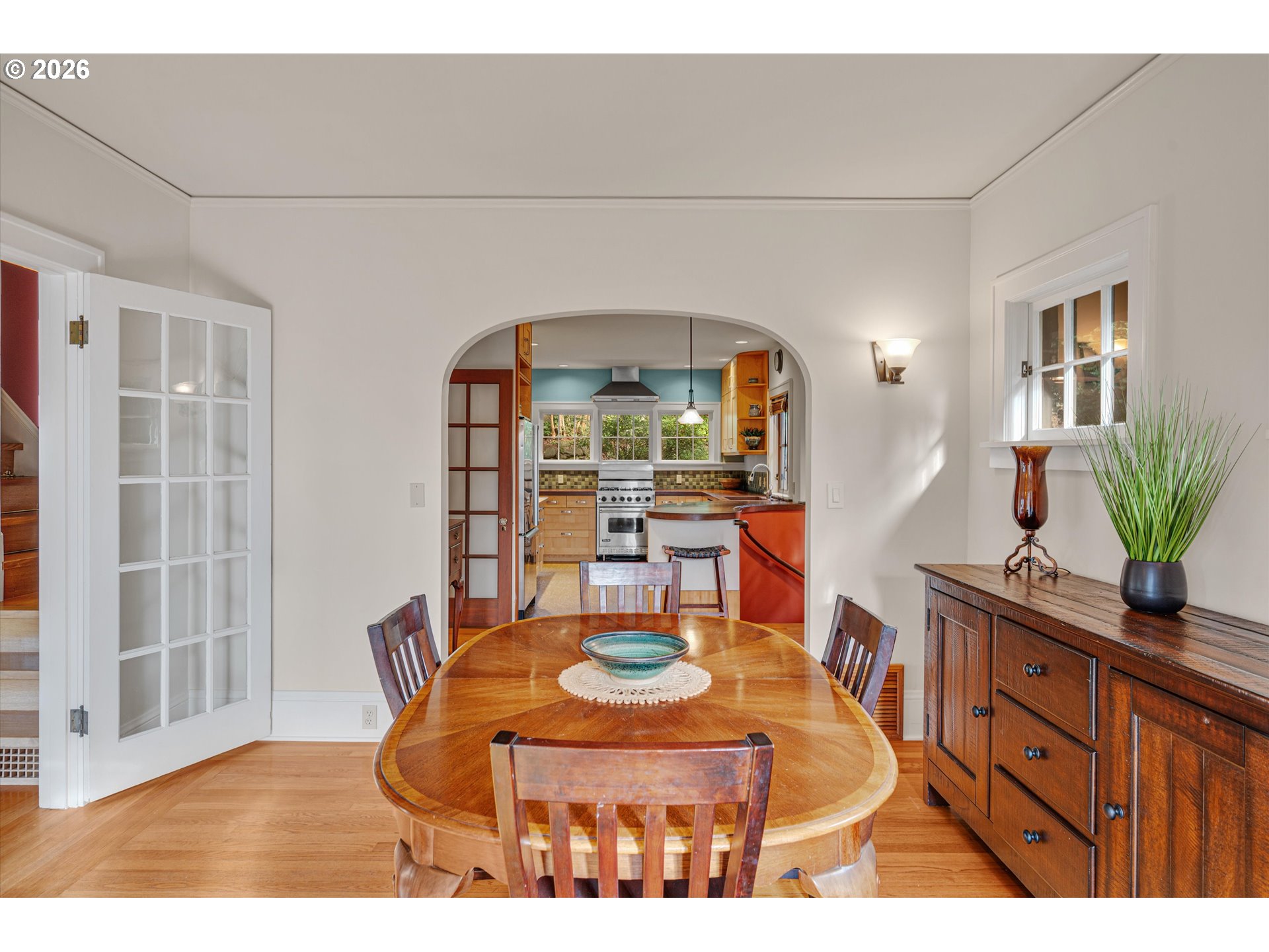 2783 Northeast Wiberg Lane Portland, OR 97213 - Photo 13 of 48 a room with furniture a potted plant and a wooden floor