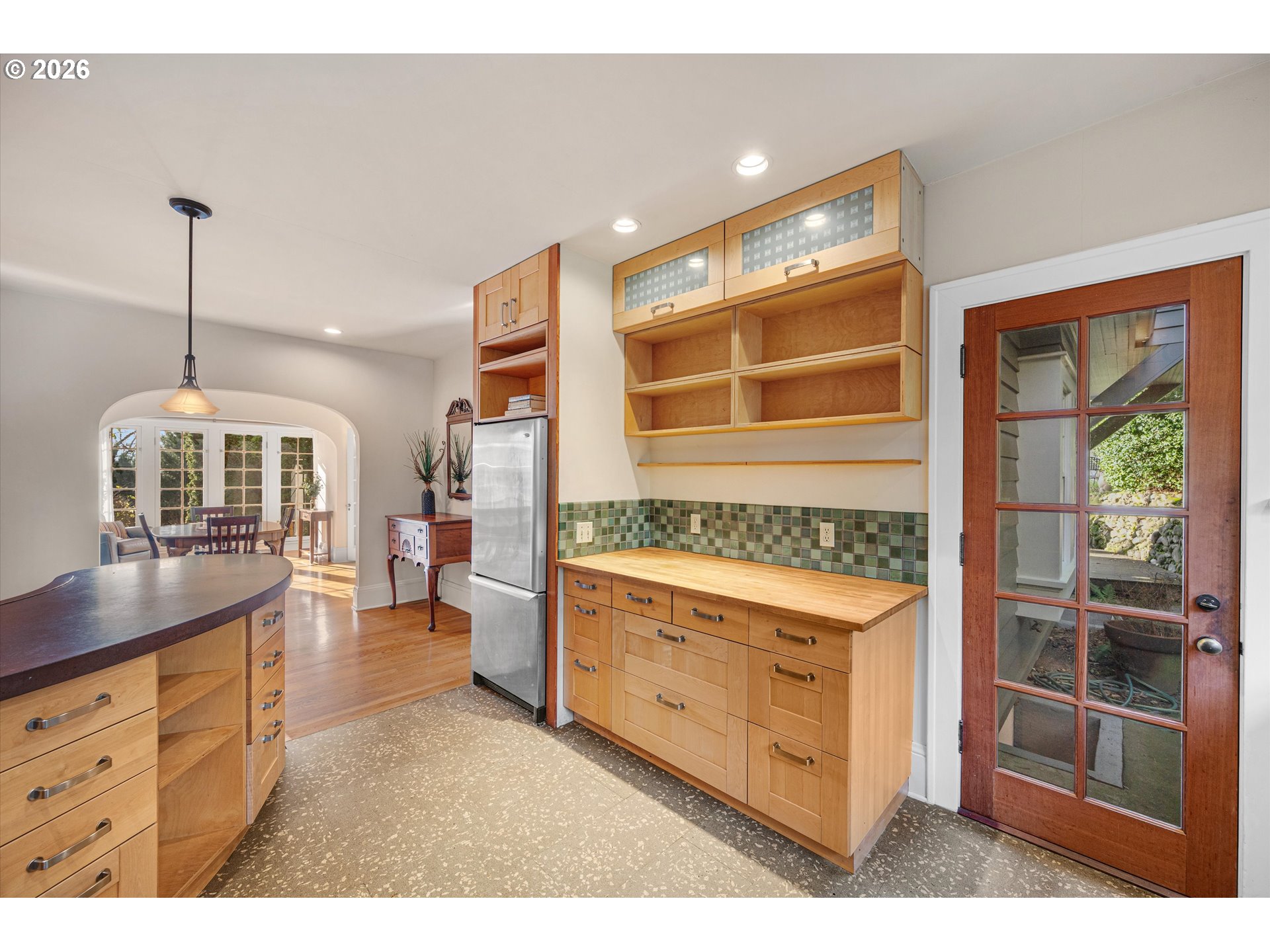 2783 Northeast Wiberg Lane Portland, OR 97213 - Photo 22 of 48 a kitchen with a stove and a wooden floor