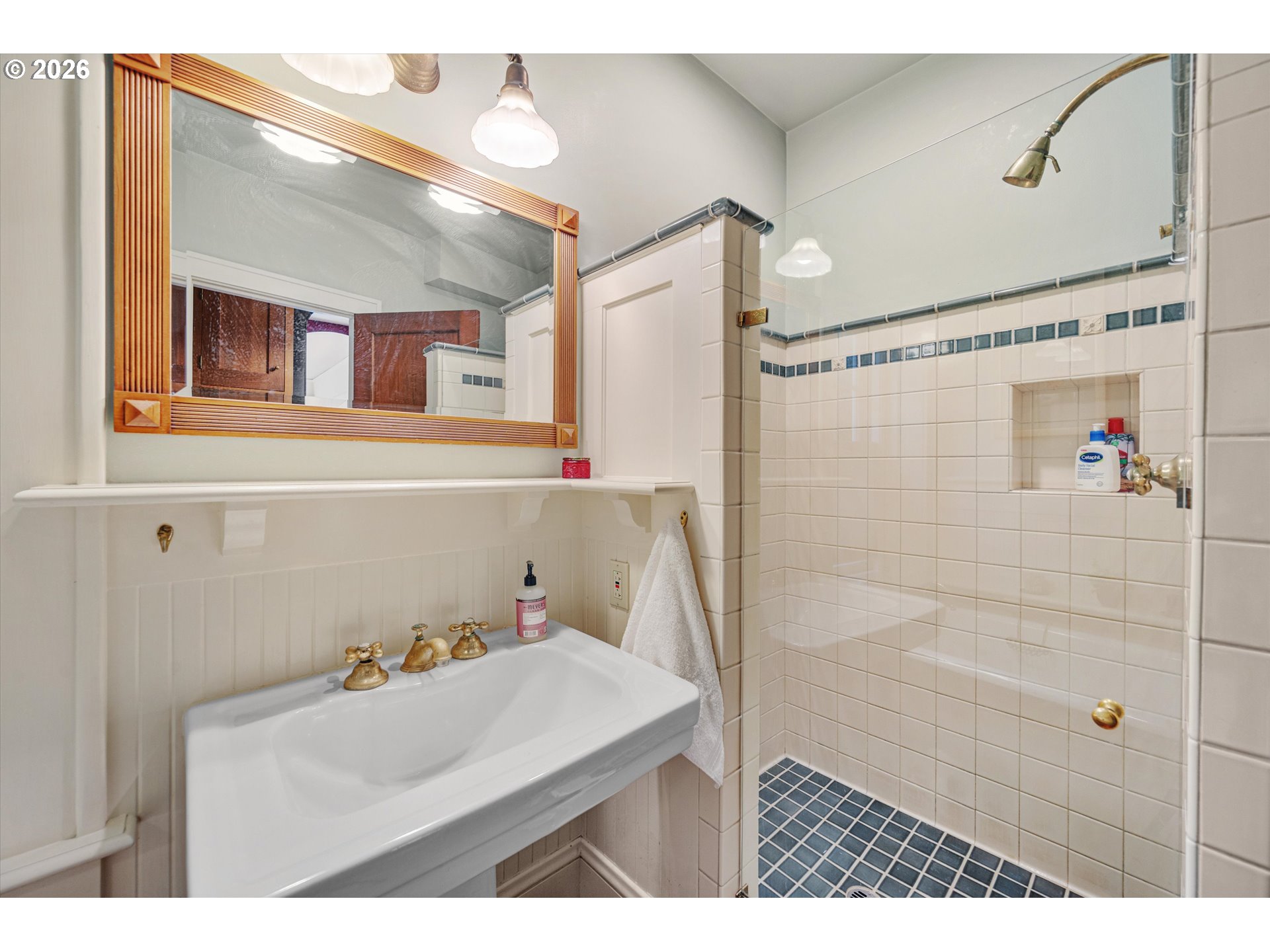 2783 Northeast Wiberg Lane Portland, OR 97213 - Photo 27 of 48 a bathroom with a sink and a shower