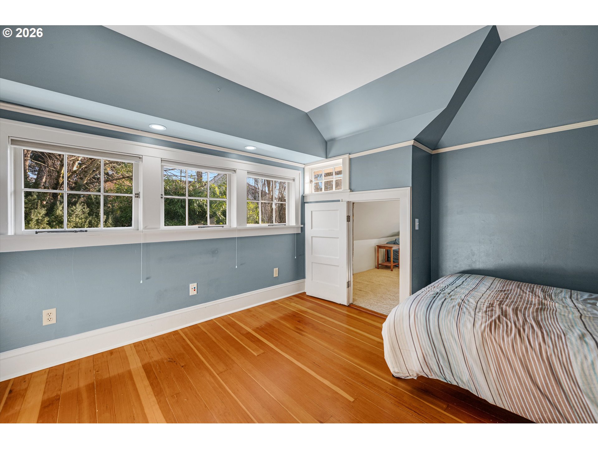 2783 Northeast Wiberg Lane Portland, OR 97213 - Photo 33 of 48 a bedroom with a bed and a window