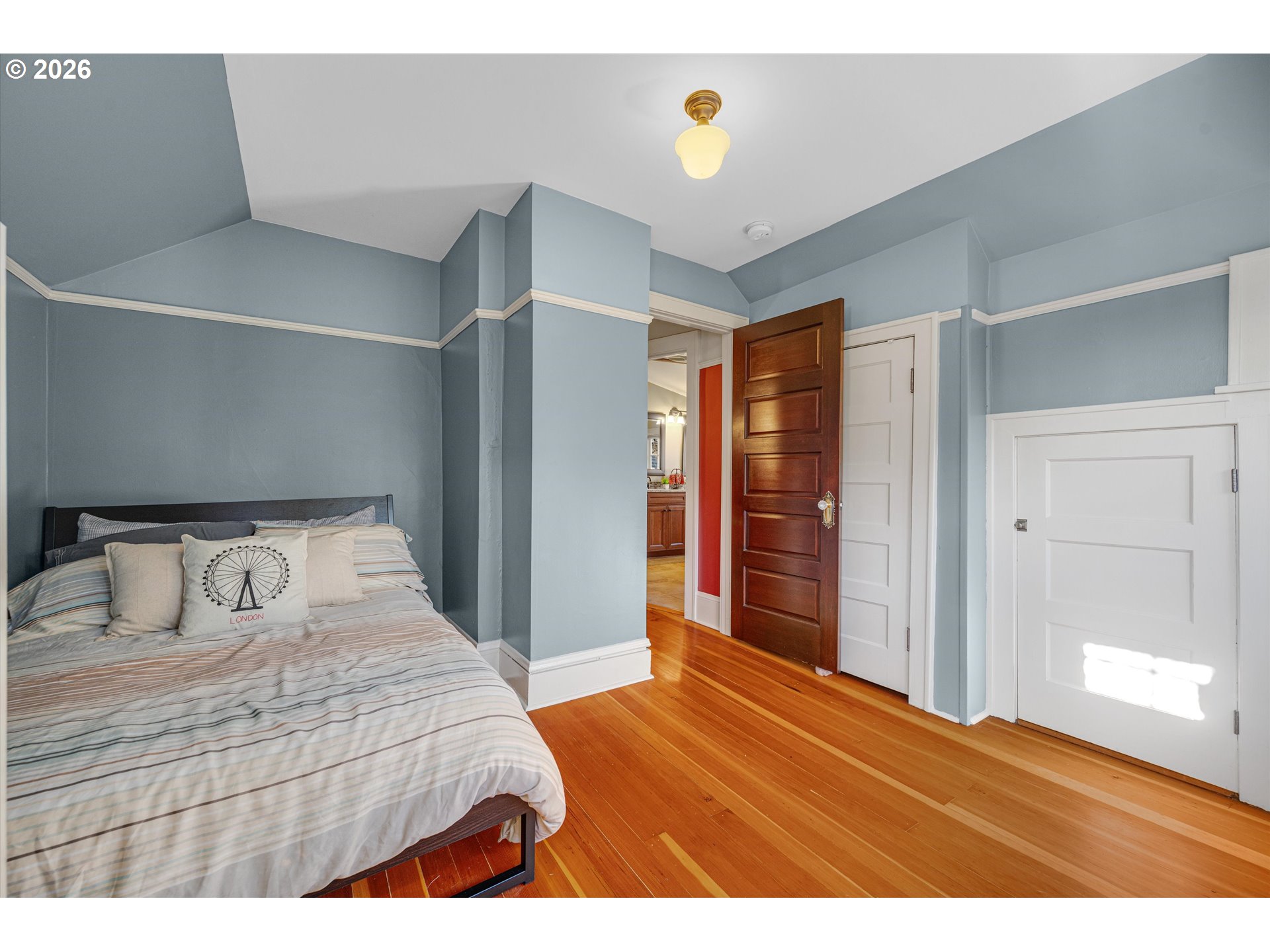 2783 Northeast Wiberg Lane Portland, OR 97213 - Photo 35 of 48 a bedroom with a bed and a window