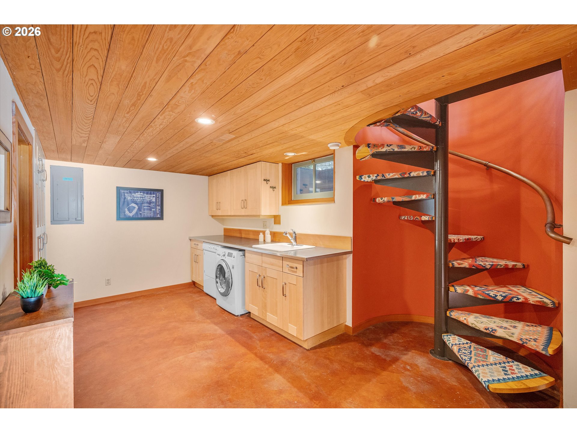 2783 Northeast Wiberg Lane Portland, OR 97213 - Photo 37 of 48 a kitchen with cabinets and wooden floor