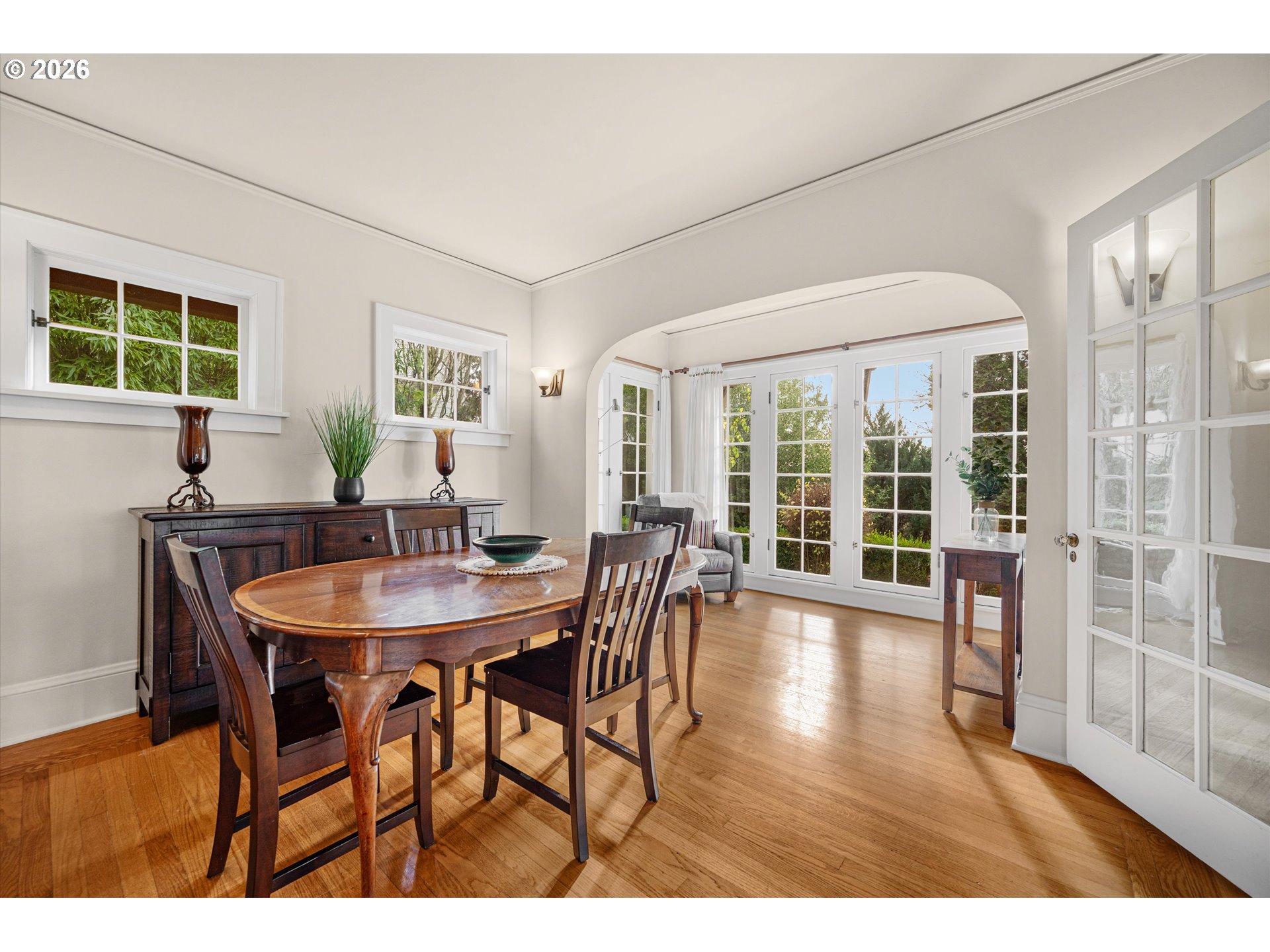 2783 Northeast Wiberg Lane Portland, OR 97213 - Photo 10 of 48 a view of a dining room with furniture and wooden floor