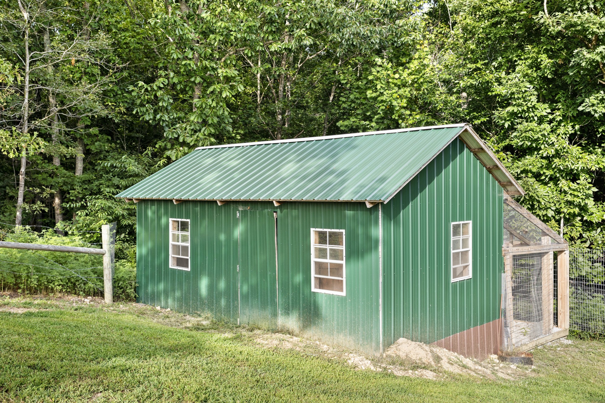 1075 Linville Road Lawrenceburg, TN 38464 - Photo 40 of 52 Got chickens? Bring them! They get a new house too! This divided out space is ready for the crew!