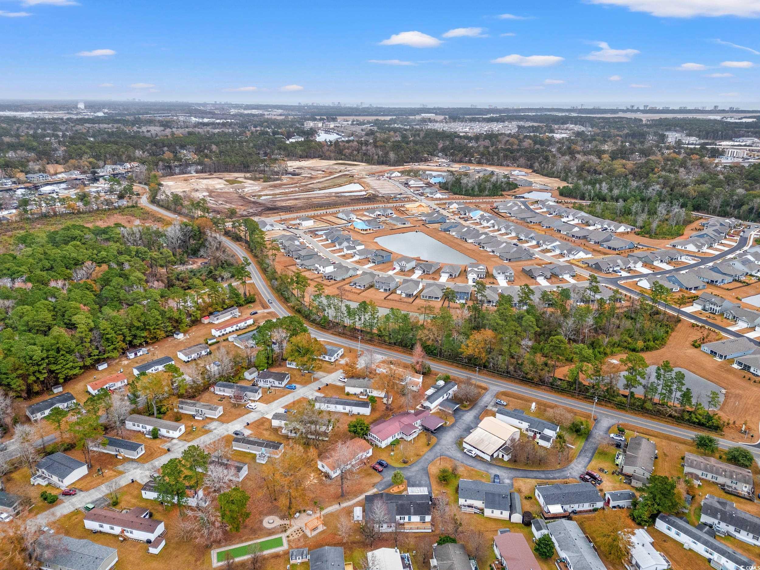 467 Freedom Circle Myrtle Beach, SC 29588 - Photo 37 of 38 Aerial view of property's location featuring a tree filled landscape and nearby suburban area