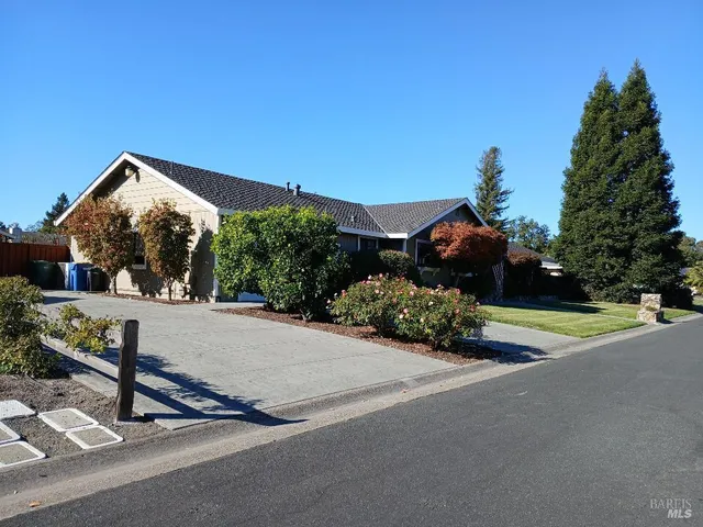 a view of a street with houses