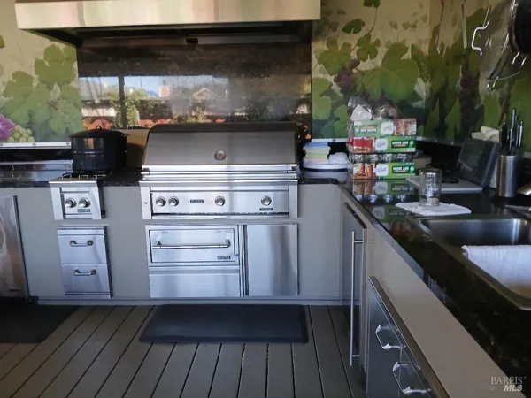 a kitchen with a stove and a microwave