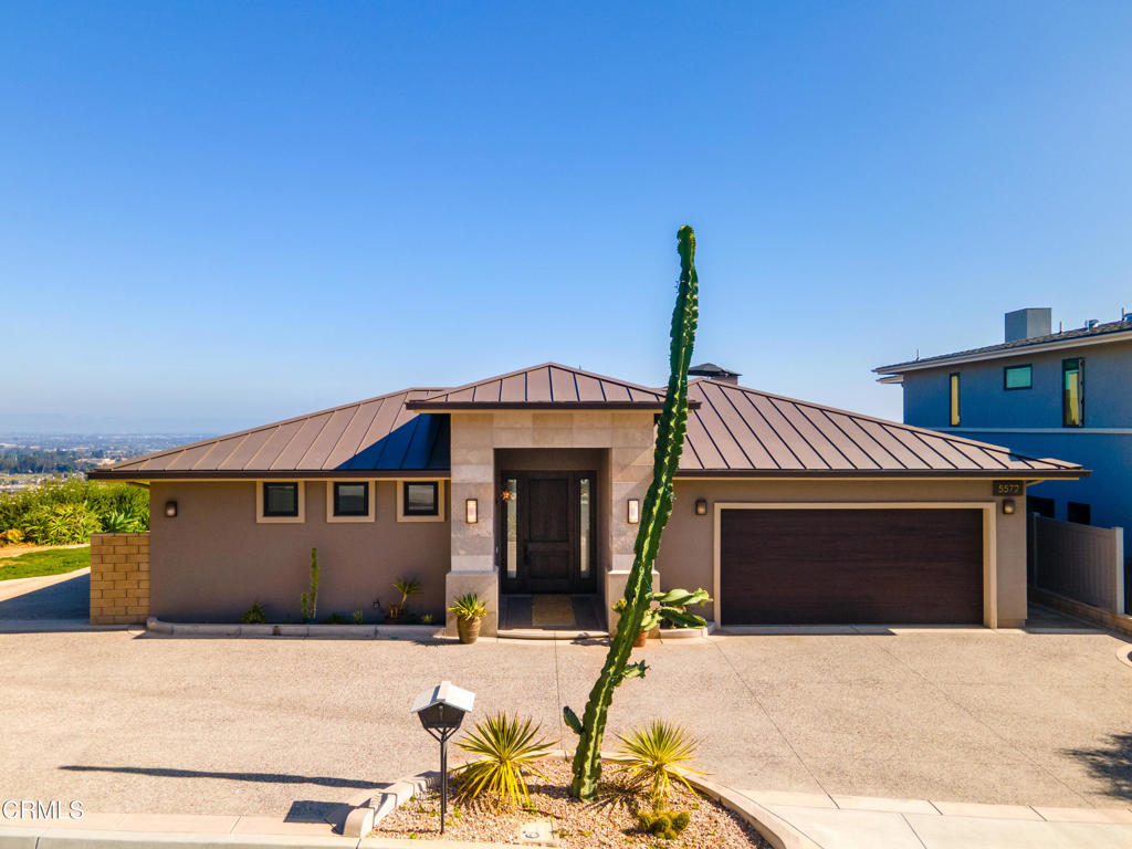 5572 Rainier Street Ventura, CA 93003 - Photo 26 of 29 a front view of a house with a yard
