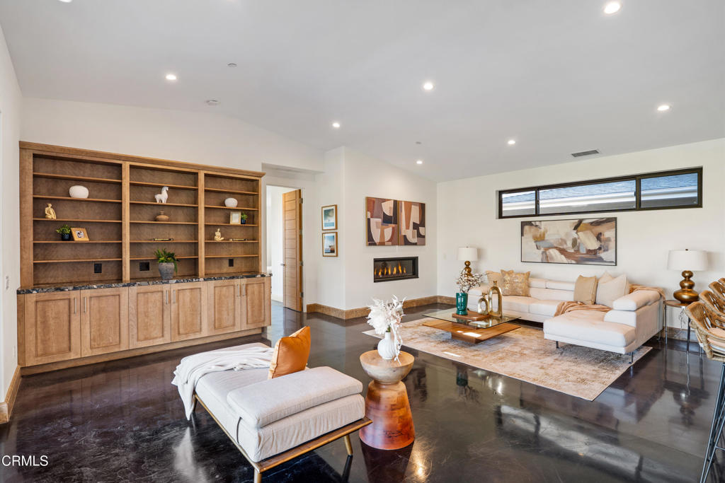 5572 Rainier Street Ventura, CA 93003 - Photo 7 of 29 a living room with furniture and a large window