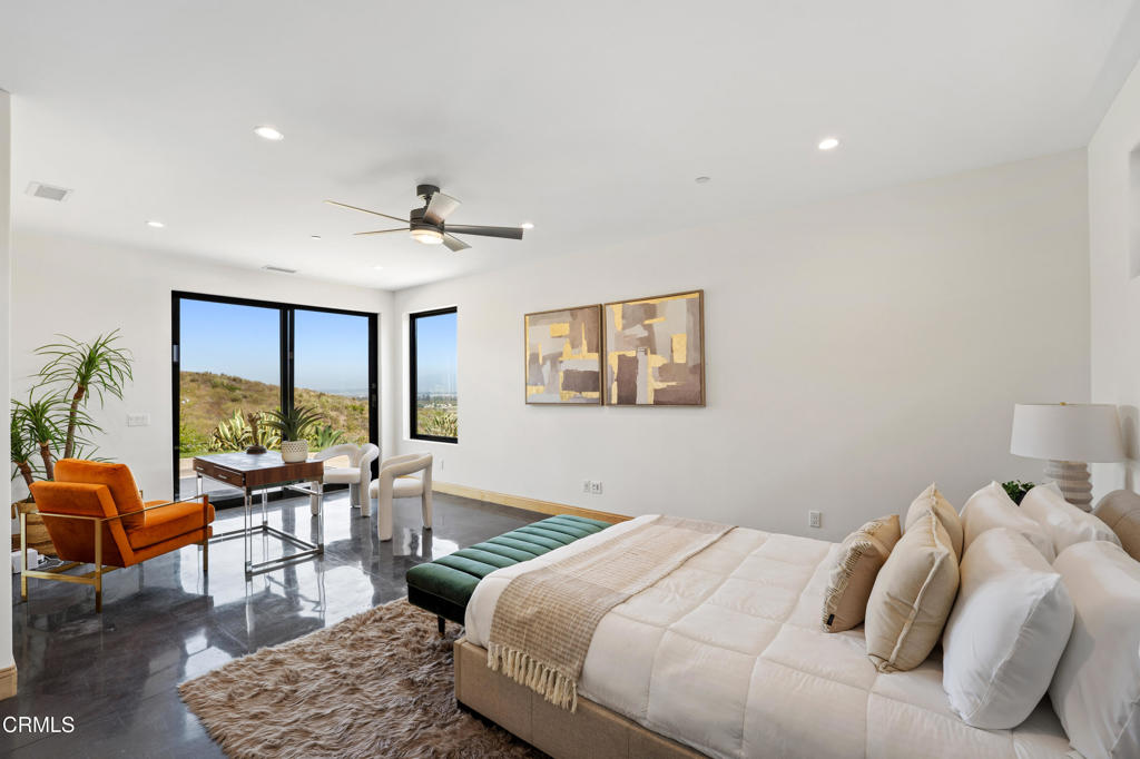 5572 Rainier Street Ventura, CA 93003 - Photo 10 of 29 a bedroom with a bed and a couch