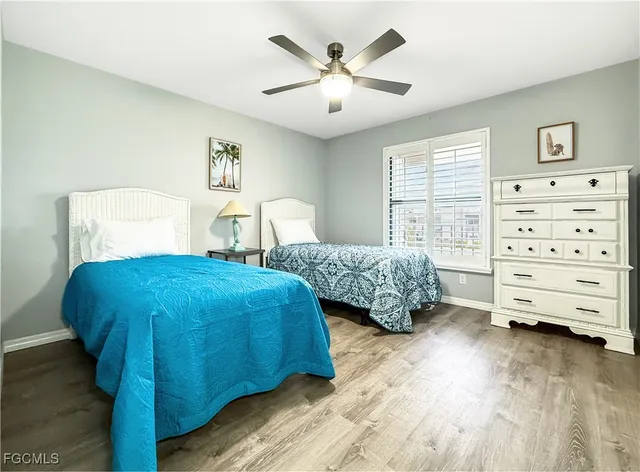 a spacious bedroom with a bed and a closet