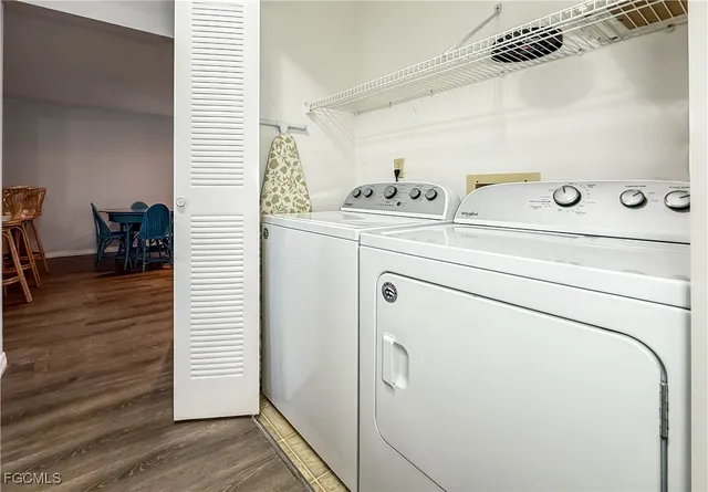 a utility room with dryer and washer