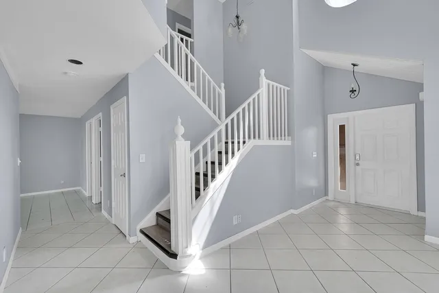 a view of entryway and hall with a window