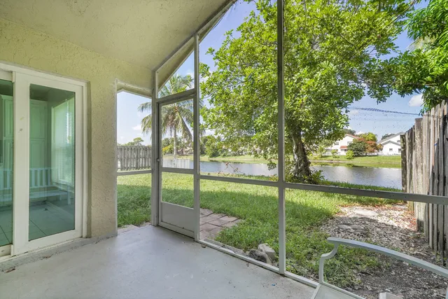 a view of backyard with green space