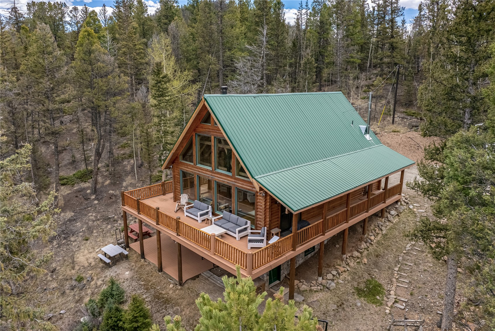 999 Bowstring Como, CO 80456 - Photo 34 of 37 an aerial view of a house with roof deck