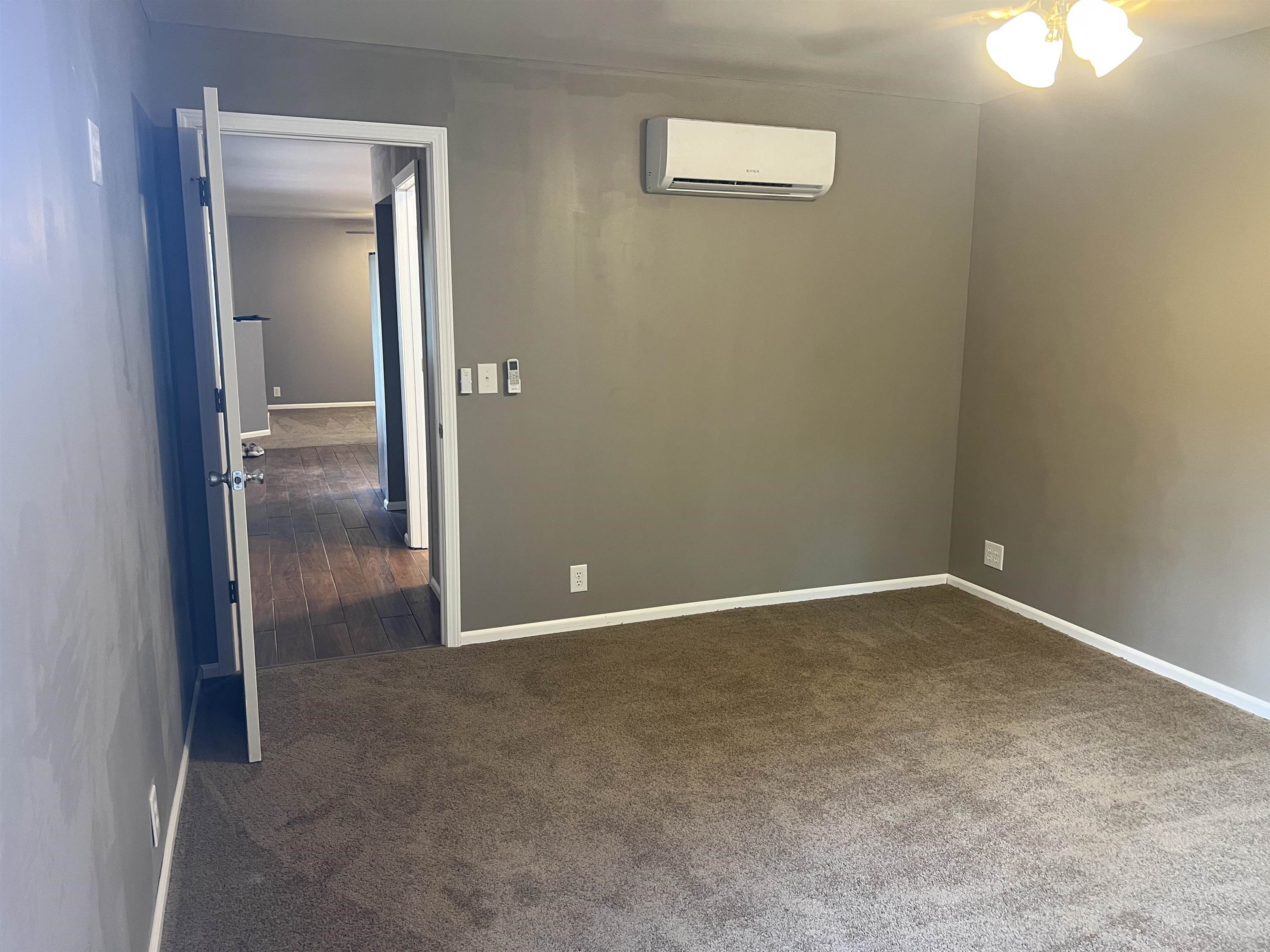 1525 Bullman Road Finger, TN 38334 - Photo 18 of 24 an empty room that has a mirror