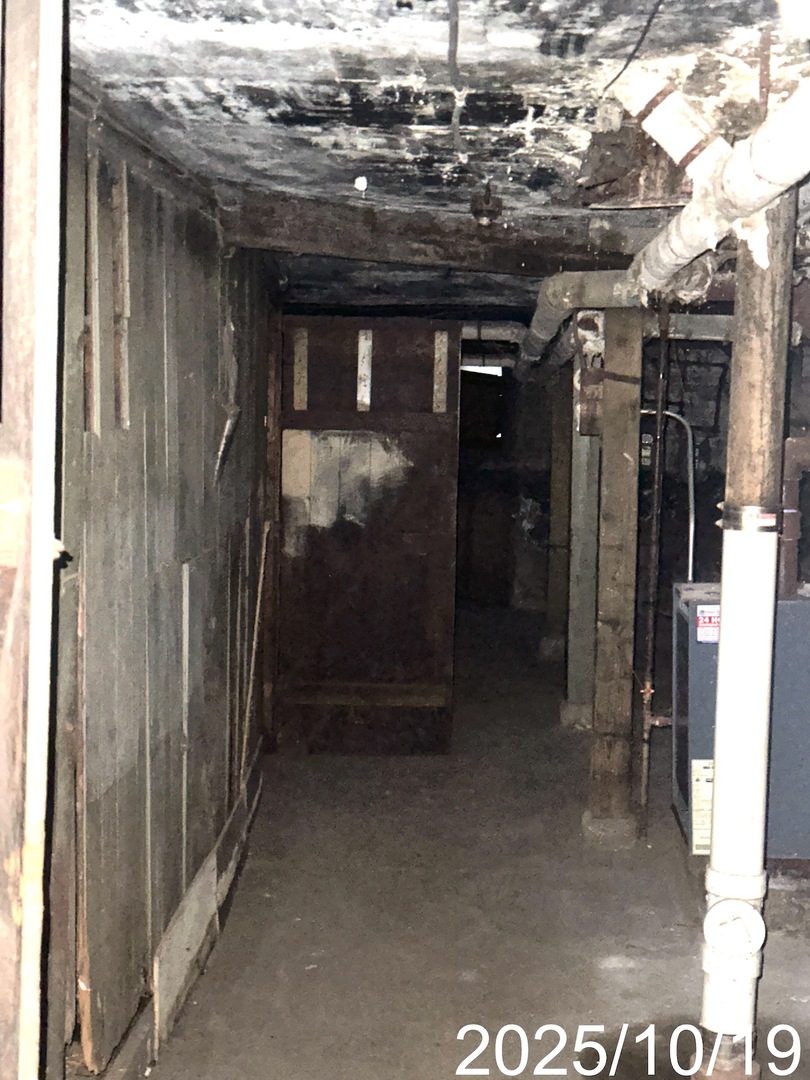 7435 South Wentworth Avenue Chicago, IL 60621 - Photo 17 of 18 a view of water heater room