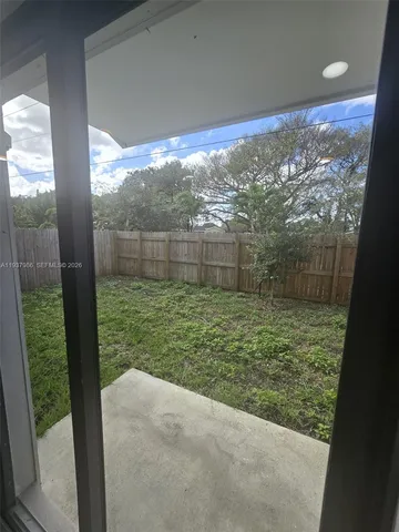 a view of outdoor space and yard