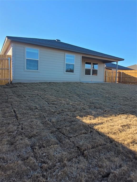 517 Coda Crossing Georgetown, TX 78633 - Photo 17 of 17 a view of a house with a yard