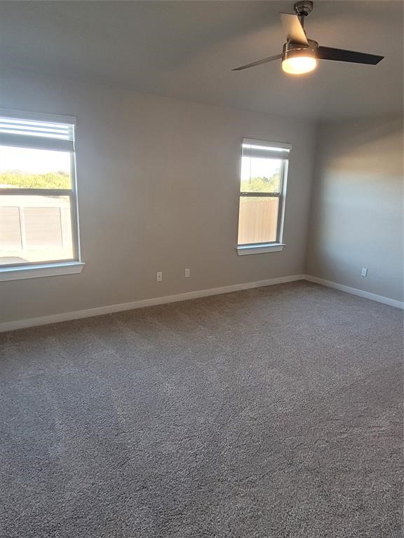 517 Coda Crossing Georgetown, TX 78633 - Photo 2 of 17 an empty room with a window