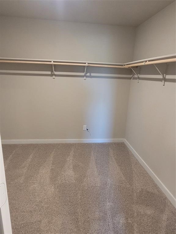 517 Coda Crossing Georgetown, TX 78633 - Photo 5 of 17 a view of a room with racks on the wall